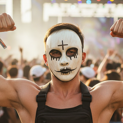 Shirtless masked guy at daytime rave in bodybuilder pose with chest bag